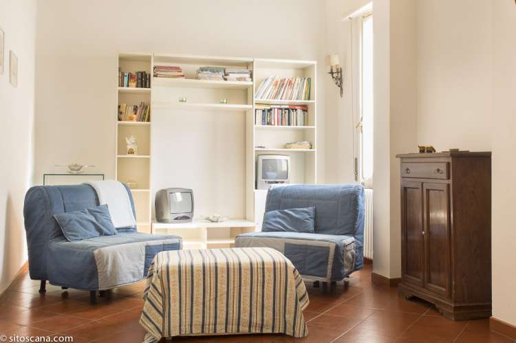 Foto av oppholdsrom med lenestoler i ferieleiligheten Marco i sentrum av Firenze, Florence..