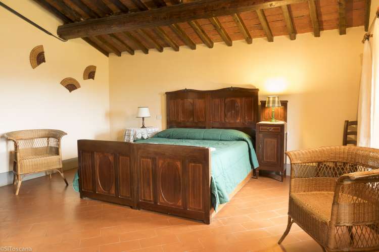 Bildet viser soverom med dobbeltseng i Villa Pace.