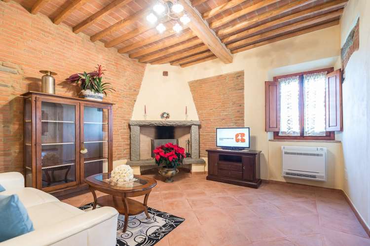 Bildet viser stue i feriehus i hjertet av Chianti.