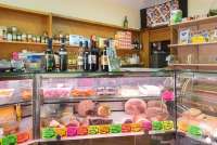 Bildet viser matbutikk i gåavstand til ferieleilighetene på Vicino Mare, sør i Toscana.