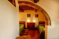 Bildet viser to enkeltsenger i ett av soverommene i 1. etg. i Villa Pace.