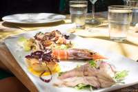 Bildet viser sjømat på restaurant i badebyen Castiglioncello.