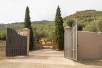 Bildet viser porten til feriehuset Casa Diana i toskansk landsby.