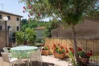 Bildet viser uteplass i feriehus på vingård mellom Pisa og Firenze.